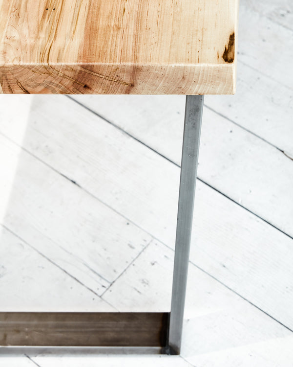 industrial table with trapezoid base